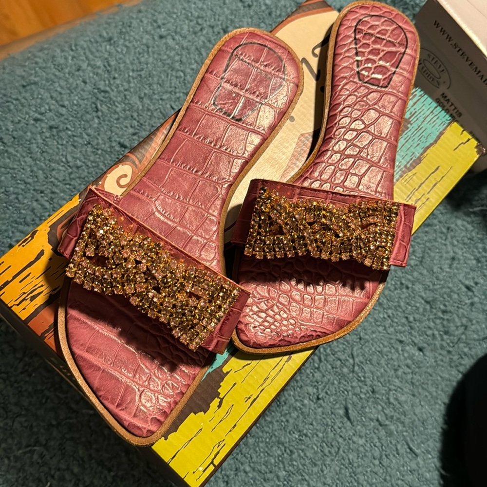 Pink rhinestone flat sandals in a 39/8-US